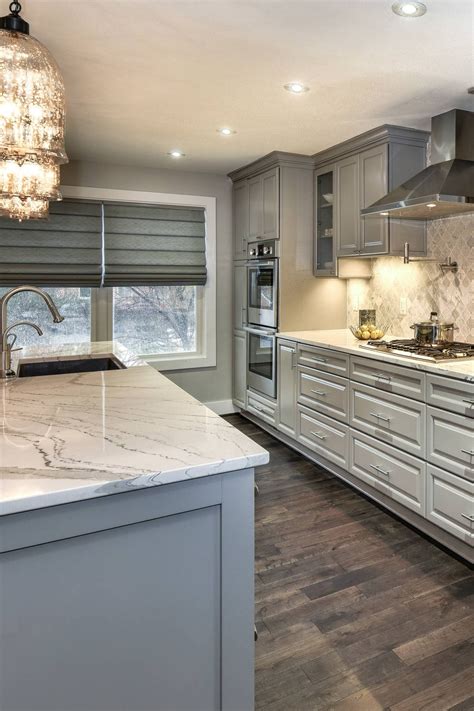 grey cabinets with marble countertops